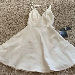 White Lulu’s dress tags still on